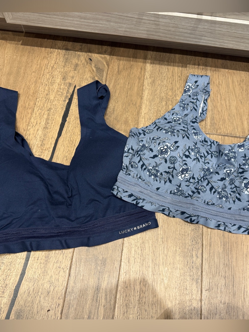 Size large -lot of two bralettes tops by Lucky Brand Navy and Floral blue/gray